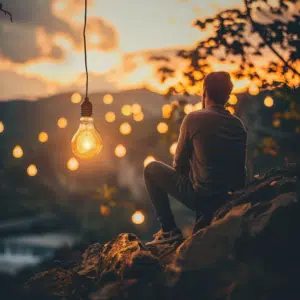 man sitting in a hill