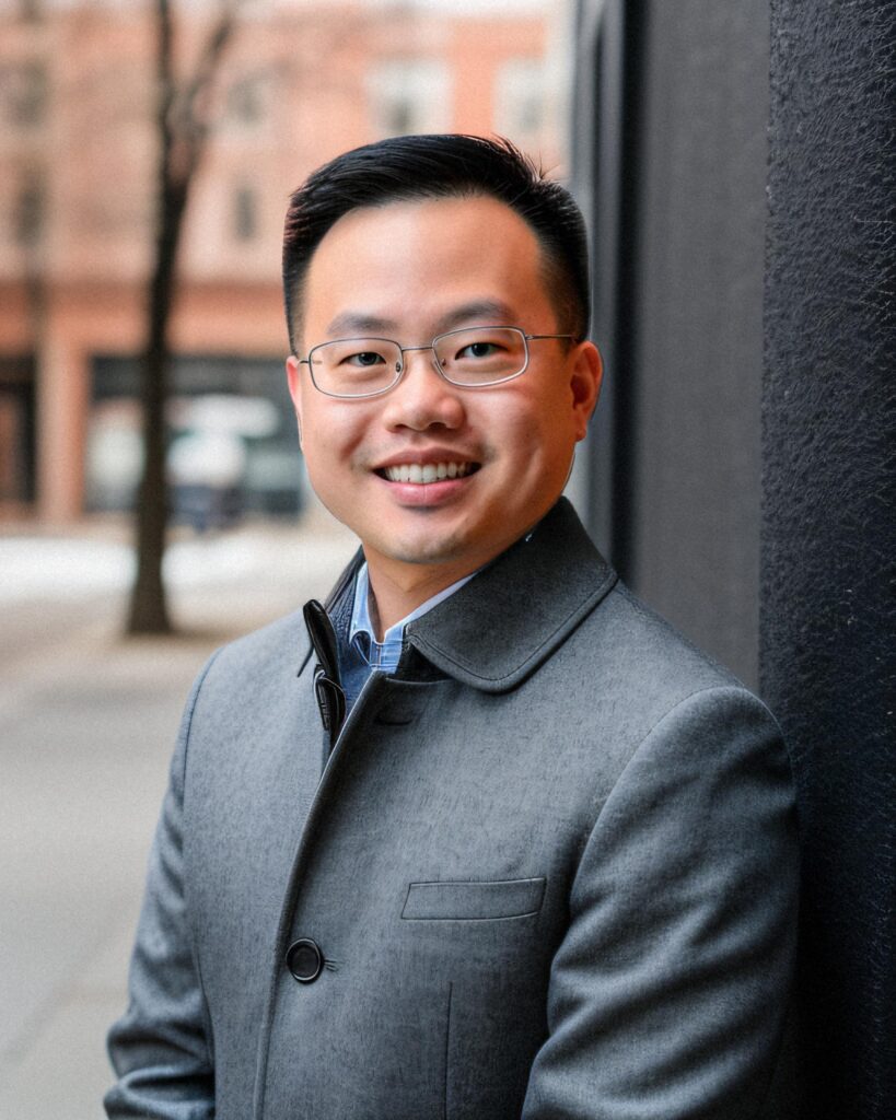 male professional headshot in coat